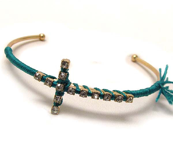 CRYSTAL CROSS AND THREAD WRAP BRACELET