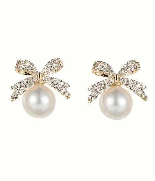 RHINESTONE BOW AND PEARL EARRING
