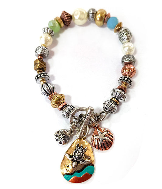 PATINA AND BURNISH  TRI TONE RETRO VINTAGE STRTCH BRACELET -TURTLE AND STARFISH