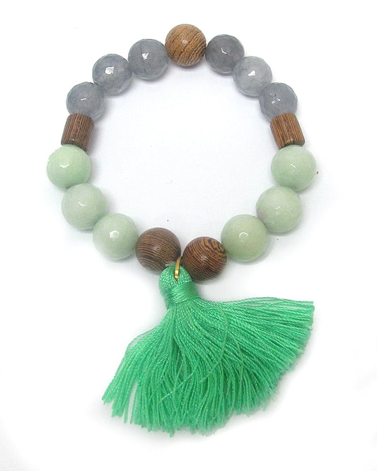 MULTI STONE AND WOODEN BALL TASSEL STRETCH BRACELET