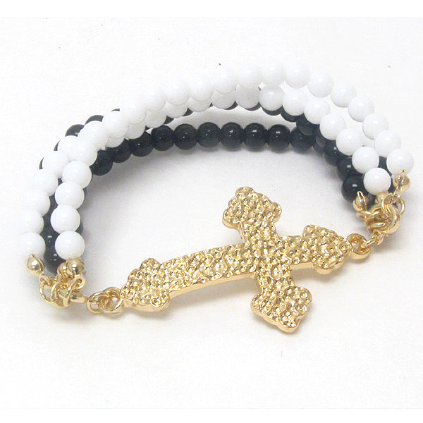 TEXTURED METAL CROSS AND BALL BEAD 4 LAYER STRETCH BRACELET