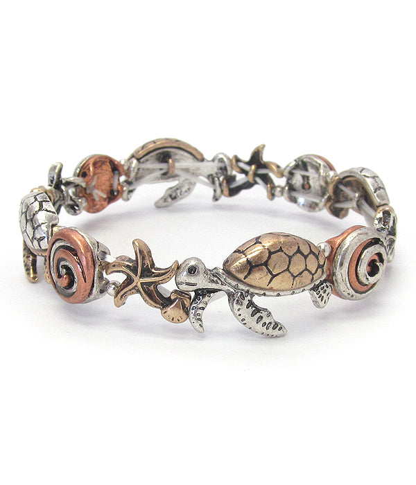 VINTAGE METAL SEALIFE THEME STRETCH BRACELET - TURTLE STARFISH