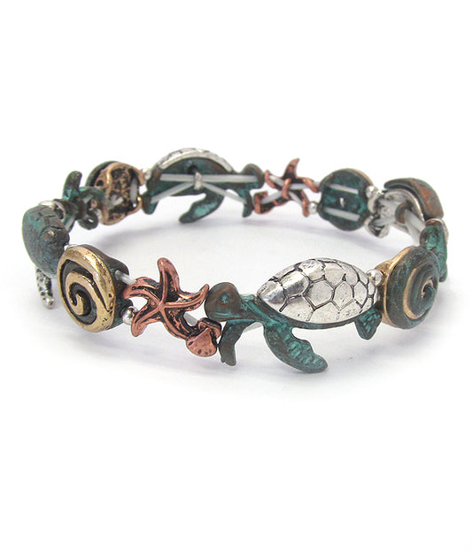 VINTAGE METAL SEALIFE THEME STRETCH BRACELET - TURTLE STARFISH